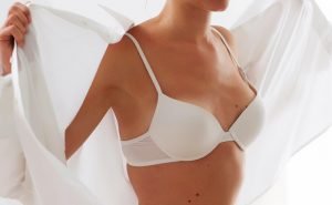 I have noticed that my breasts change the shape throughout the month. What is the reason for this?