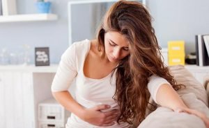 I have observed that I suffer from constipation just before my periods Why is it so?