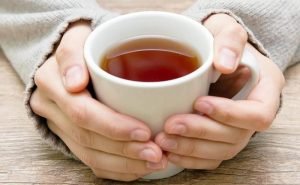 I sweat a lot, drink lots of water and take around 20 cups of tea a day. Is that the reason for my severe PMS?