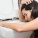 Sometime after drinking when I vomit, it is slightly brownish in color. Why is it so?