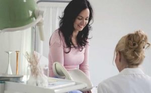 What are symptoms and treatment for cervical erosion?