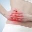 Where is the pain in the appendicitis and what are its symptoms.